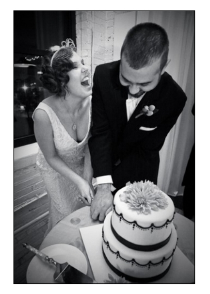 Kirk and me cutting the cake.